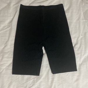 Skims barely there mid thigh short